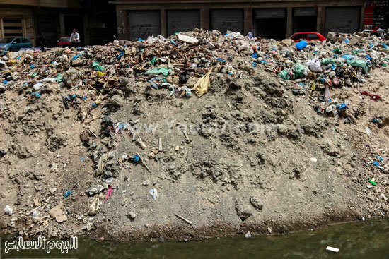 أكوام القمامة على جانبى الترعة -اليوم السابع -6 -2015